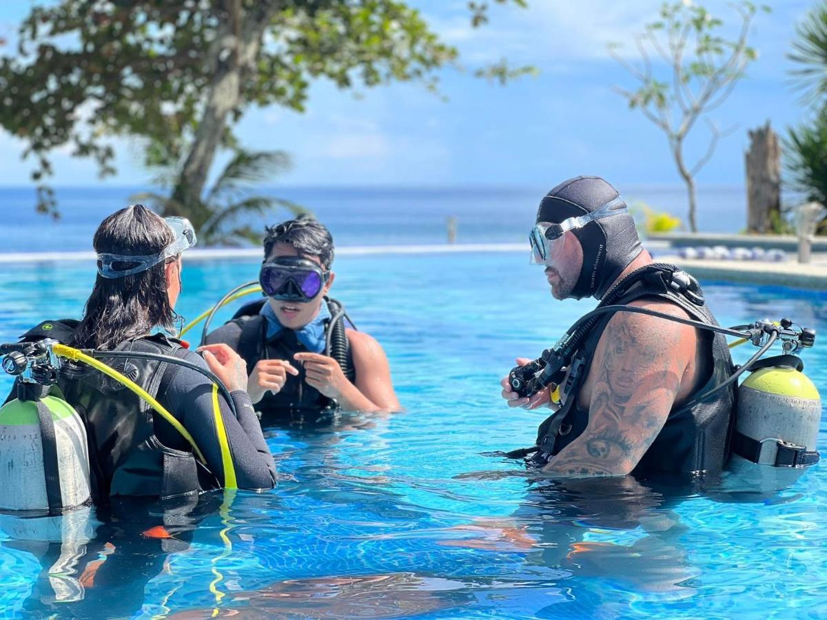 Infinity Diving Resort And Residences Дауин Экстерьер фото